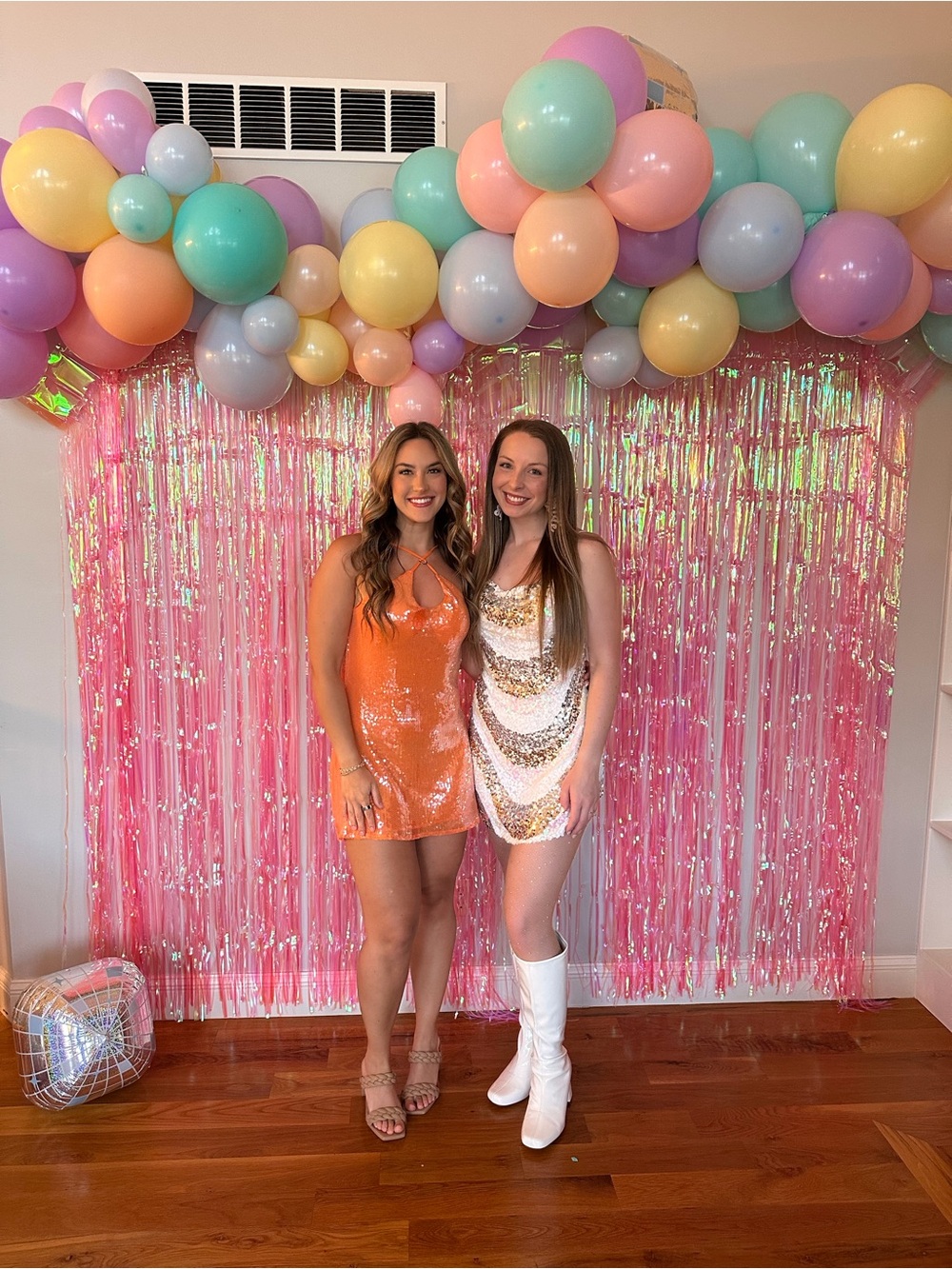 Orange sequin open back halter dress